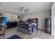 Bedroom with a bed, dresser, and ceiling fan at 5052 Florentine Ct, Spring Hill, FL 34608