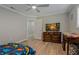 Bedroom with dresser, desk, and ceiling fan at 5052 Florentine Ct, Spring Hill, FL 34608