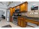 Modern kitchen with stainless steel appliances and ample cabinetry at 5052 Florentine Ct, Spring Hill, FL 34608