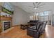 Comfortable living room with hardwood floors and a fireplace at 5052 Florentine Ct, Spring Hill, FL 34608