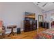 Main bedroom features a large dresser and hardwood floors at 5052 Florentine Ct, Spring Hill, FL 34608