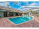 Inviting screened pool area at 5052 Florentine Ct, Spring Hill, FL 34608