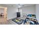 bedroom with batman-themed bedding and rug at 5206 Whispering Leaf Trl, Valrico, FL 33596