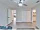Spacious bedroom with double doors leading to another room at 5206 Whispering Leaf Trl, Valrico, FL 33596