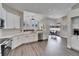 Open concept kitchen with a view into the living room and dining area at 5206 Whispering Leaf Trl, Valrico, FL 33596