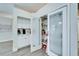 Well-stocked pantry with glass-paned doors at 5206 Whispering Leaf Trl, Valrico, FL 33596