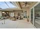 Spacious patio with seating area and pool access at 5206 Whispering Leaf Trl, Valrico, FL 33596