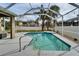 Refreshing screened pool with steps and patio at 5206 Whispering Leaf Trl, Valrico, FL 33596