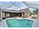 Large screened in pool and spacious patio at 5206 Whispering Leaf Trl, Valrico, FL 33596