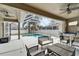 Enjoy this screened pool and patio perfect for outdoor entertaining at 5206 Whispering Leaf Trl, Valrico, FL 33596