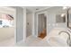 Updated bathroom with a shower, vanity, and tile floors at 5332 Nutcracker Cir, Land O Lakes, FL 34639