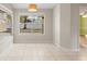 Breakfast nook with tile floor and large window overlooking backyard at 5332 Nutcracker Cir, Land O Lakes, FL 34639