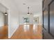 Spacious living room with hardwood floors and sliding glass doors at 5332 Nutcracker Cir, Land O Lakes, FL 34639