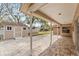 Covered patio, shed and fenced backyard at 5332 Nutcracker Cir, Land O Lakes, FL 34639
