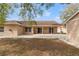 Large patio with access to backyard at 5332 Nutcracker Cir, Land O Lakes, FL 34639