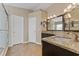 Elegant bathroom with granite countertops and walk-in shower at 5809 War Admiral Dr, Wesley Chapel, FL 33544