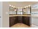 Spacious bathroom with double vanity and granite countertops at 5809 War Admiral Dr, Wesley Chapel, FL 33544