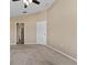 Large bedroom with carpet flooring and double door closet at 5809 War Admiral Dr, Wesley Chapel, FL 33544