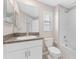 Bathroom with single vanity, tub, and shower at 7227 Sweet Alyssum Ct, Tampa, FL 33619