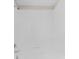 Clean bathtub with tiled surround at 7227 Sweet Alyssum Ct, Tampa, FL 33619