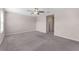 Spacious bedroom with carpeted floor and ceiling fan at 7227 Sweet Alyssum Ct, Tampa, FL 33619