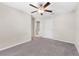 Spacious bedroom with neutral walls and ceiling fan at 7227 Sweet Alyssum Ct, Tampa, FL 33619