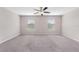 Spacious bedroom with carpet and ceiling fan at 7227 Sweet Alyssum Ct, Tampa, FL 33619