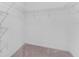 Walk-in closet with wire shelving; great storage space at 7227 Sweet Alyssum Ct, Tampa, FL 33619