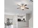 Open concept kitchen with island and dining area at 7227 Sweet Alyssum Ct, Tampa, FL 33619