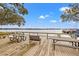 Community deck offers tranquil waterfront views, perfect for relaxing or enjoying time with Gathering and friends at 90 S Highland Ave # 1306, Tarpon Springs, FL 34689
