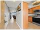 This home features an open concept with tile floors in the entryway, kitchen and dining areas at 90 S Highland Ave # 1306, Tarpon Springs, FL 34689