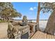 Outdoor grill area offers a scenic waterfront backdrop, perfect for barbecues and entertaining guests at 90 S Highland Ave # 1306, Tarpon Springs, FL 34689