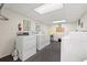 Well-maintained laundry room with multiple washers and dryers provides convenience for residents at 90 S Highland Ave # 1306, Tarpon Springs, FL 34689