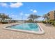 Sparkling community pool offers a refreshing escape with serene water views and comfortable lounging areas at 90 S Highland Ave # 1306, Tarpon Springs, FL 34689