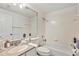 Clean bathroom with a tub and shower combination at 10025 Cypress Shadow Ave, Tampa, FL 33647