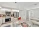 Bright kitchen with granite island and white cabinets at 10025 Cypress Shadow Ave, Tampa, FL 33647