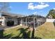 Spacious backyard with screened patio and grill at 10079 83Rd Way, Seminole, FL 33777