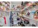 Large walk-in pantry with ample shelving for storage at 10079 83Rd Way, Seminole, FL 33777