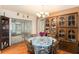 Cozy dining area with a round table and built in hutch at 10504 Tapestry Dr, Port Richey, FL 34668