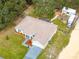 Aerial view showing the house, yard, and a motor home at 11421 Petrel Ave, Weeki Wachee, FL 34614