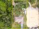 House and lot aerial view, showing surrounding land at 11421 Petrel Ave, Weeki Wachee, FL 34614