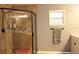 Clean bathroom with a large shower and updated fixtures at 11421 Petrel Ave, Weeki Wachee, FL 34614
