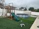 Large backyard with playground, above ground pool, and storage shed at 1202 W Camellia Dr, Brandon, FL 33510