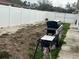Backyard with grill, small burner, and space for outdoor entertaining at 1202 W Camellia Dr, Brandon, FL 33510