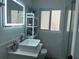 Clean bathroom with a floating vanity and a large mirror at 1202 W Camellia Dr, Brandon, FL 33510