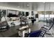Enclosed Florida Room with kitchen, seating and a TV at 1202 W Camellia Dr, Brandon, FL 33510