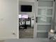 Home office with sliding barn door and modern workspace at 1202 W Camellia Dr, Brandon, FL 33510