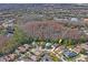 Aerial view of home and surrounding area at 1301 Horsemint Ln, Wesley Chapel, FL 33543