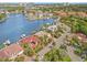 Waterfront home with solar panels, private dock, and lush tropical landscaping at 1818 Dolphin S Blvd, St Petersburg, FL 33707