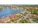 Aerial view of a waterfront home showcasing solar panels and a private dock at 1818 Dolphin S Blvd, St Petersburg, FL 33707